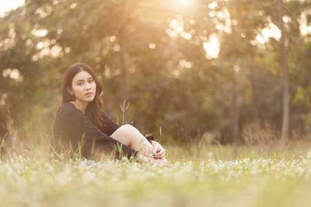 Pretty Thai girl Smiling at the parkの写真素材