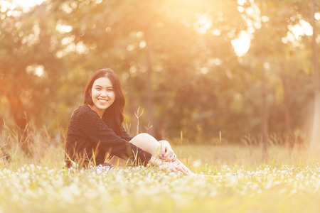 Pretty Thai girl Smiling at the parkの写真素材