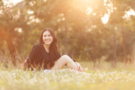 Pretty Thai girl Smiling at the parkの写真素材