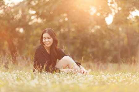 Pretty Thai girl Smiling at the parkの写真素材