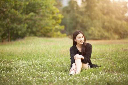 Pretty Thai girl Smiling at the parkの写真素材
