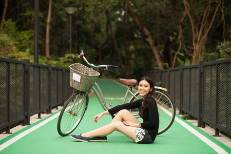 Pretty Thai girl Smiling at the parkの写真素材
