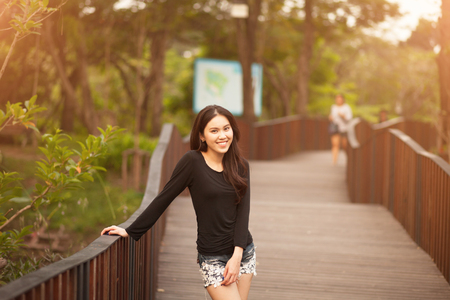 Pretty Thai girl Smiling at the parkの写真素材