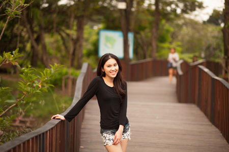 Pretty Thai girl Smiling at the parkの写真素材