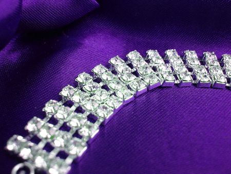 Close up of dimond necklace on a violet backgroundの写真素材