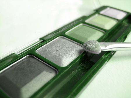 Set of green eyeshadows and applicator brushの写真素材