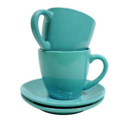 two blue cups with saucer over white backgroundの写真素材