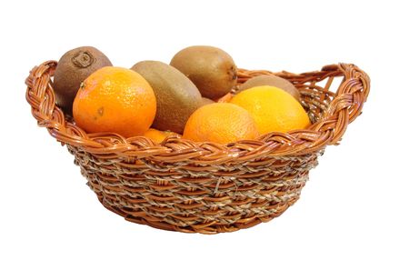 orange and kiwi in basket over white backgroundの写真素材