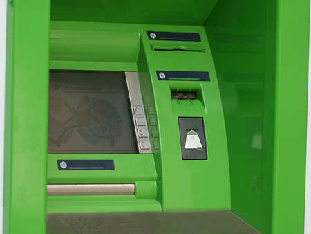 Modern indoor automatic teller machine at a bank (ATM) の写真素材