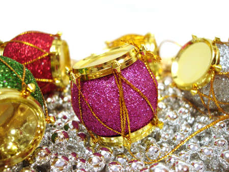 colored Christmas decoration drum over beautiful background の写真素材