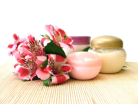 cosmetic moisturizing cream with flowers の写真素材