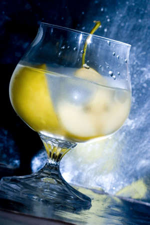 pear in glass with martini and ice の写真素材