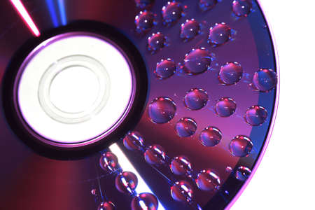 violet water drop on disk for background の写真素材