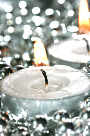 white candles with silver decoration balls の写真素材