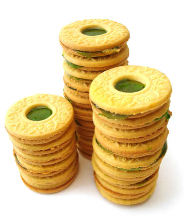 cookies with kiwi jelly over white background の写真素材