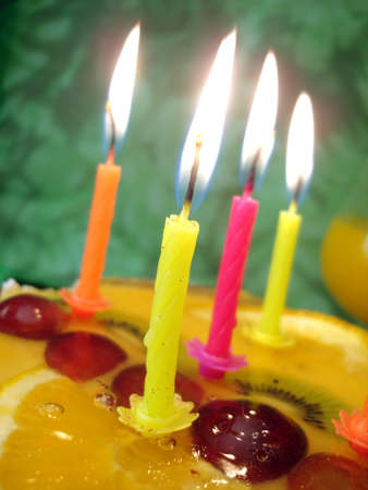 close-up of candle with birthday cake の写真素材