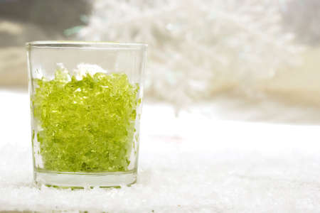 festive new-year candle with snow 