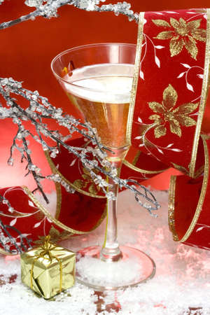 glass with champagne and gift box の写真素材