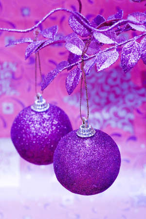 purple Christmas balls on beautiful tree の写真素材