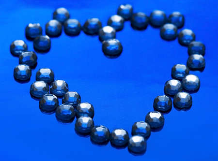heart from brilliant on blue background の写真素材