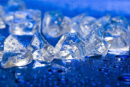 close-up of ice cubes on blue 