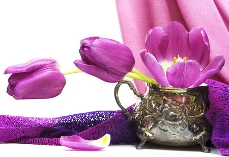 violet flowers in vase with fabric の写真素材