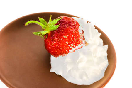 strawberry on plate over white background の写真素材