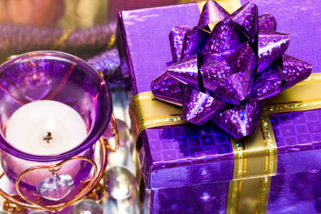 violet candle with  and gift box 