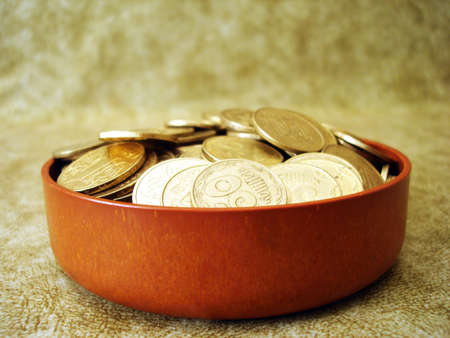 golden coins in a small box の写真素材