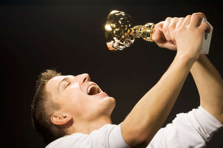 man is glad the won cupの写真素材