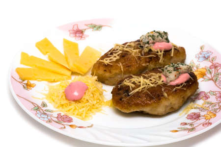 chops with the grated cheese on a dish の写真素材