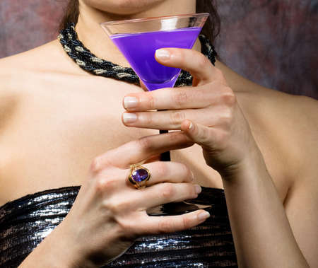 young sexy woman with glass of wineの写真素材