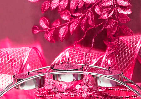 festive candles with red ribbon の写真素材