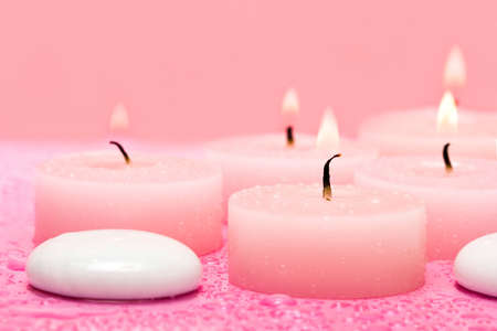 Spa essential, candles and pebbles の写真素材