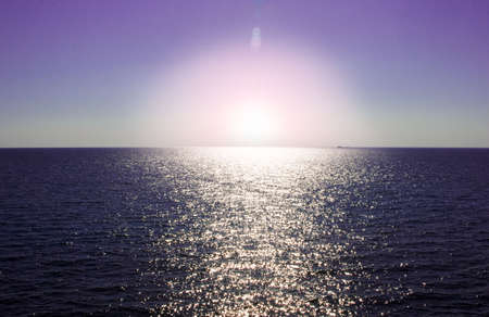 violet sunset at the seaside の写真素材