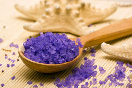 Spoon with bath salt and seastar の写真素材