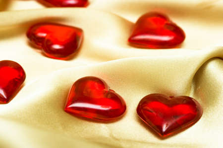 many hearts on golden silk の写真素材