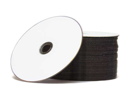 stack of Cd or DVD roms isolated on white background の写真素材