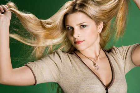pretty girl on green background の写真素材