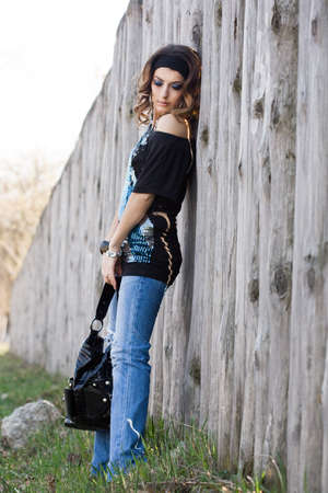 Beautiful woman in the street with handbag の写真素材