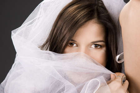 Bride in beautiful white veil 