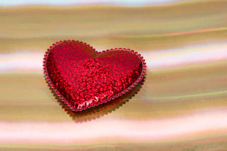 red heart on gold background の写真素材