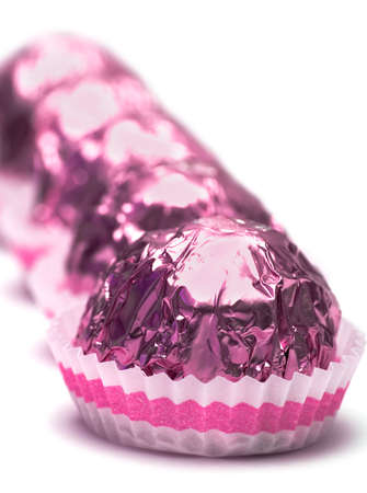 chocolate candies isolated on white background の写真素材