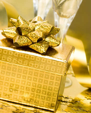 gift box with golden ribbon の写真素材