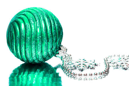 green festive decoration on silver background の写真素材