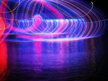 Abstract background with coloured lightの写真素材