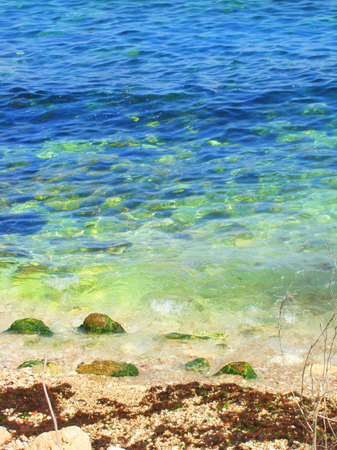 sea with rocks on a beachの写真素材