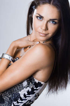 Sexy fashionable woman on greyの写真素材