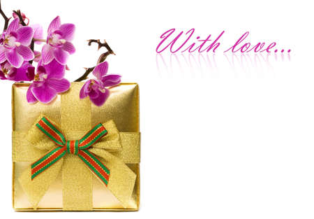 Gift box with purple orchid の写真素材