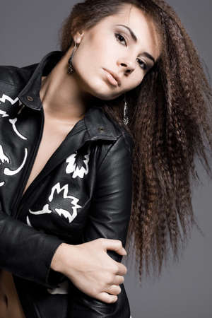 beautiful woman on grey backgroundの写真素材